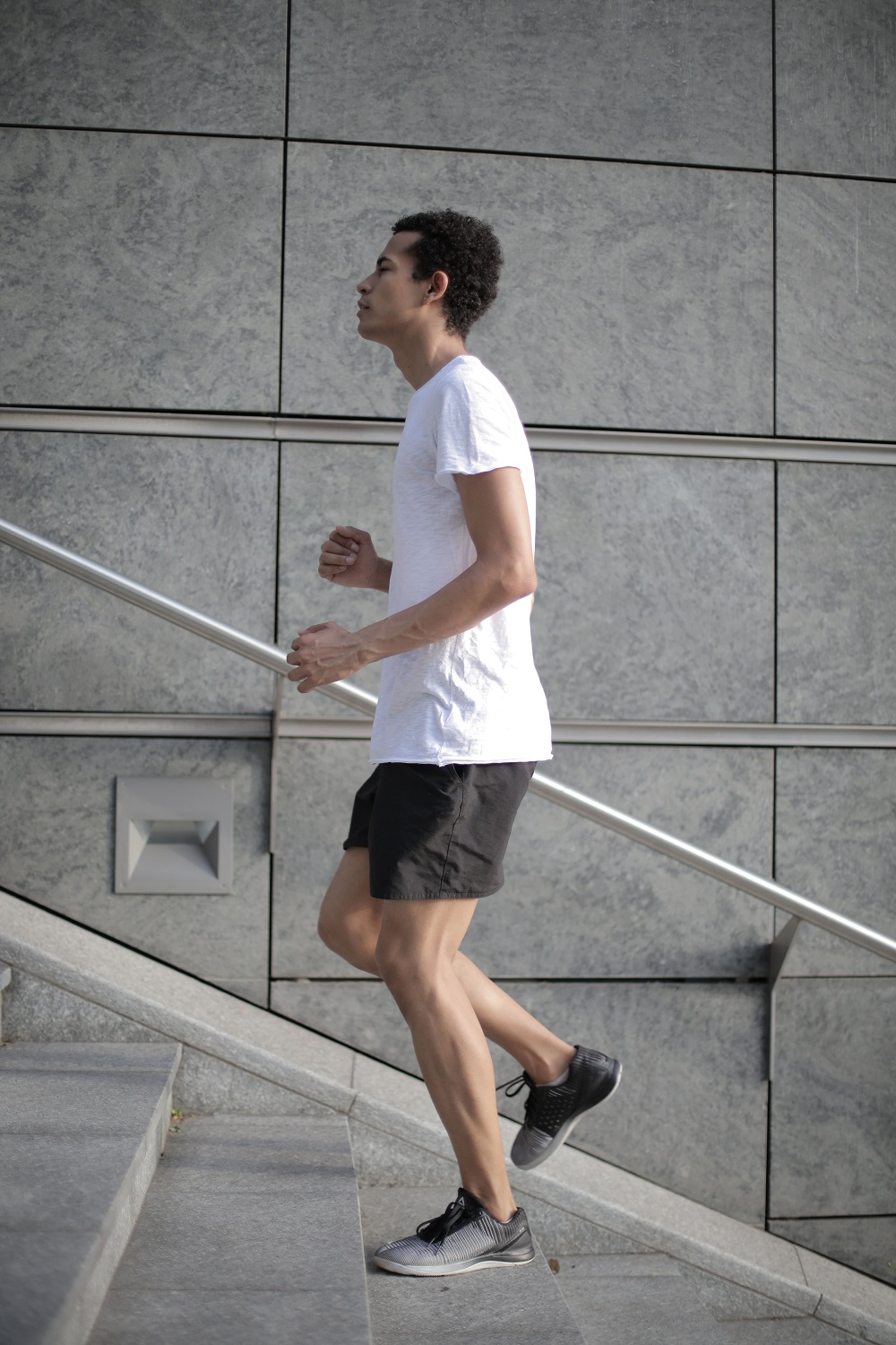 man running up stairs
